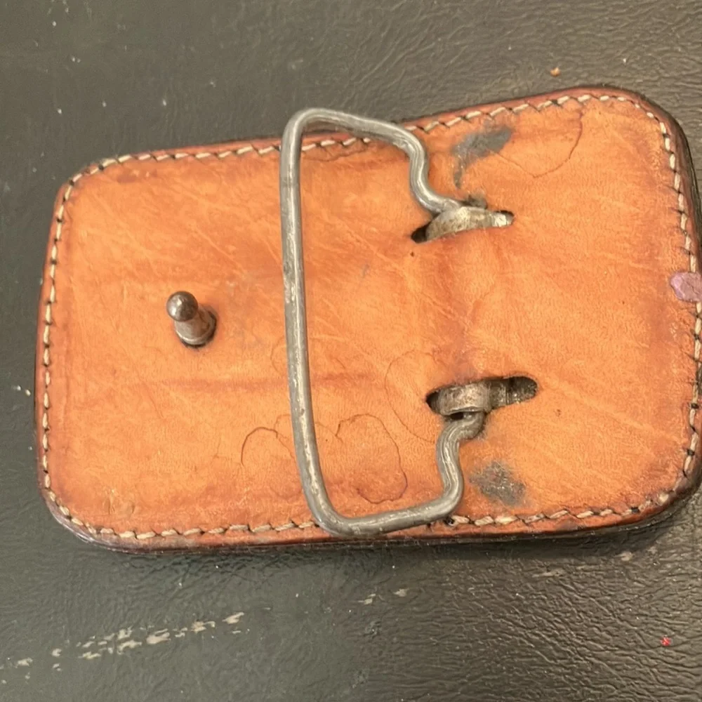 Leather and embroidered belt buckle